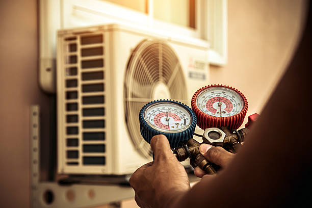 Professional Heat Pump Repair technician working in Poway, CA
